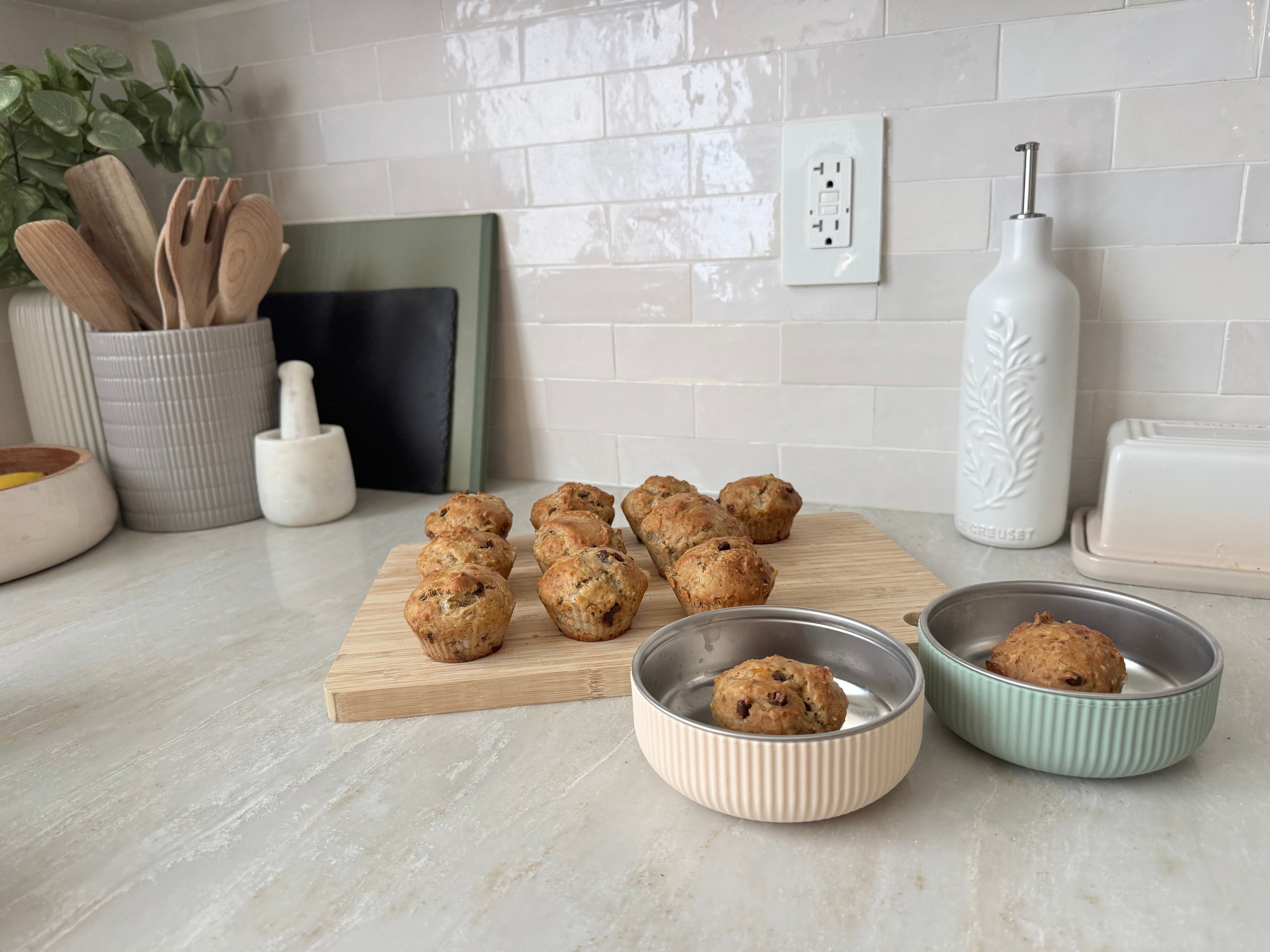 High-protein banana bread muffins served in stainless steel bowls