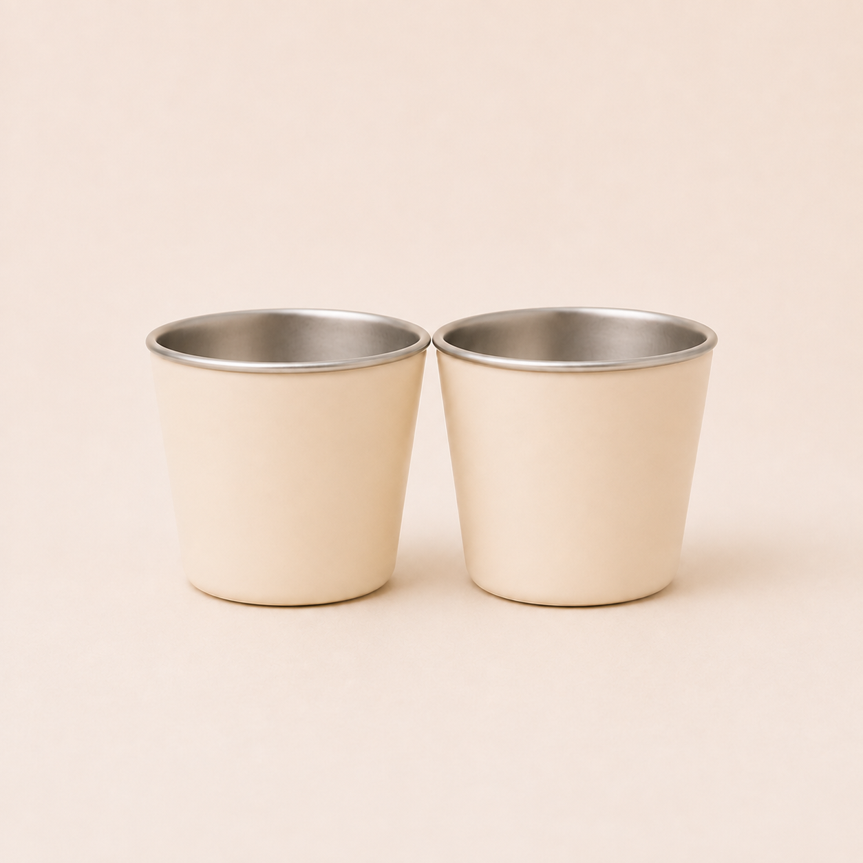 BRAI + CO. baby and toddler stainless steel and silicone drinking cup in Butter Cream.